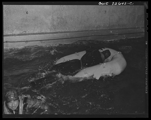 Bar Harbor, Maine. Civil Air Patrol base headquarters of coastal patrol no. 20. Testing rubber crash boat in the swimming pool