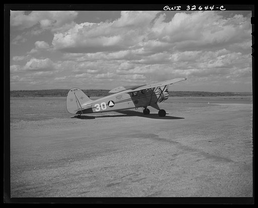 Untitled photo, possibly related to: Bar Harbor, Maine. Civil Air Patrol base headquarters of coastal patrol no. 20. Taking off for patrol duty