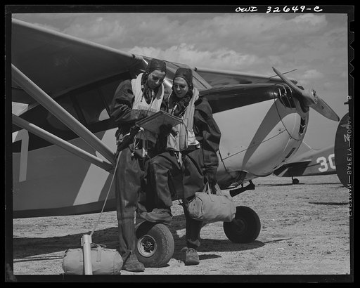 Bar Harbor, Maine. Civil Air Patrol base headquarters of coastal patrol no. 20. A pilot and an observer dressed in rubber crash suits worn by fliers throughout the winter months