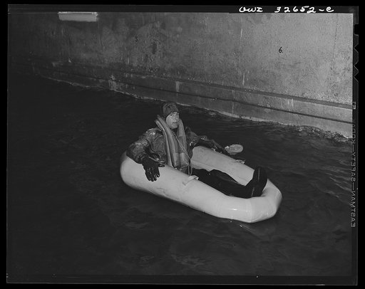 Bar Harbor, Maine. Civil Air Patrol base headquarters of coastal patrol no. 20. Testing a rubber crash boat in the swimming pool