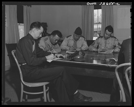Untitled photo, possibly related to: Bar Harbor, Maine. Civil Air Patrol base headquarters of coastal patrol no. 20. Classes in submarine detection and shipping identification are held each morning after dawn patrol