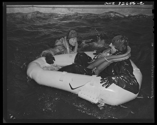 Bar Harbor, Maine. Civil Air Patrol base headquarters of coastal patrol no. 20. Testing a rubber crash boat in the swimming pool