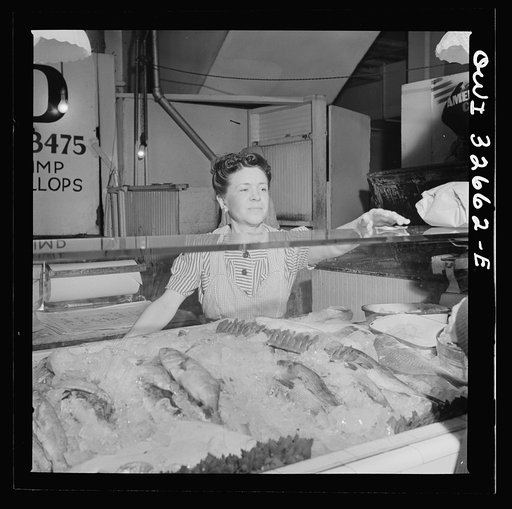 Washington, D.C. Blanche Beavers waiting on a customer in the Arcade seafood market