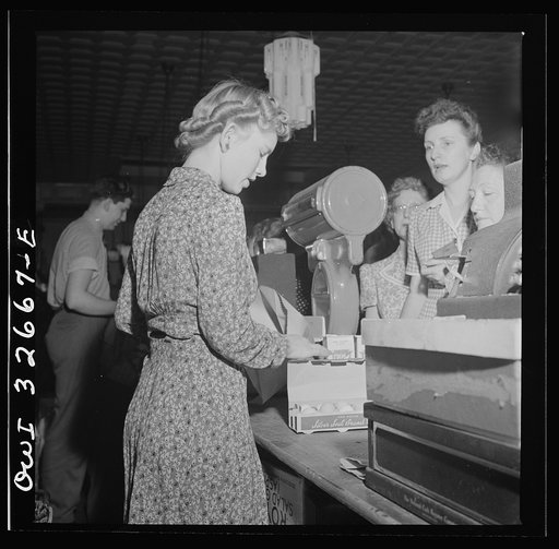 Untitled photo, possibly related to: Washington, D.C. Louise Sprouse, a checker at the Acme grocery store on Fourteenth Street. She formerly lived in Blacksley, South Carolina