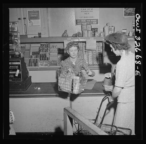 Washington, D.C. Louise Sprouse, a checker at the Acme grocery store on Fourteenth Street. She formerly lived in Blacksley, South Carolina