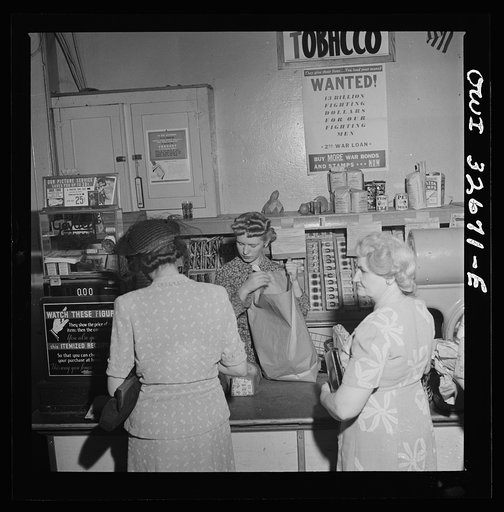 Washington, D.C. Louise Sprouse, a checker at the Acme grocery store in Fourteenth Street. She formerly lived in Blacksley, South Carolina