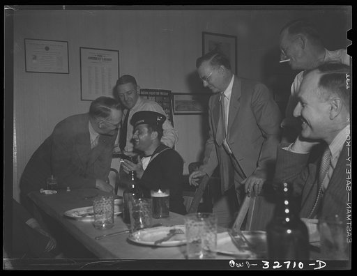 Oswego, New York. The American Legion post entertaining a Greek sailor during United Nations week