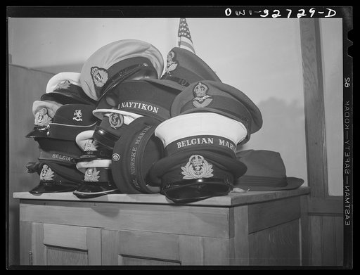 Oswego, New York. United Nations heroes' hats stacked while they eat supper served by the women of the Presbyterian church