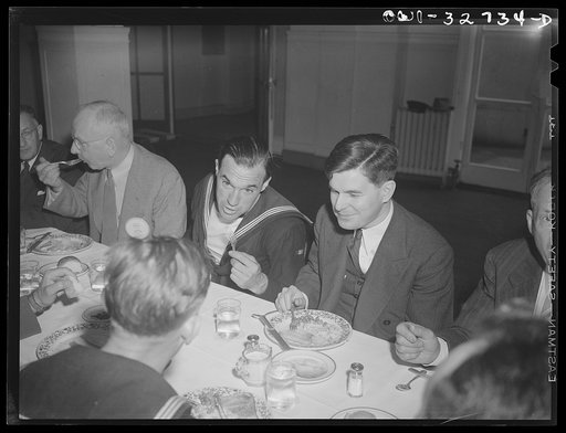 Oswego, New York. Presbyterian minister (right) and a Belgian sailor at the Rotary Club luncheon during United Nations week