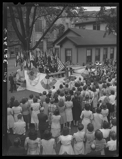Oswego, New York. United Nations heroes addressing workers at the Columbia Mills during United Nations week
