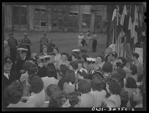 Untitled photo, possibly related to: Oswego, New York. United Nations heroes mingling with workers at the Columbia Mills after the United Nations week ceremony