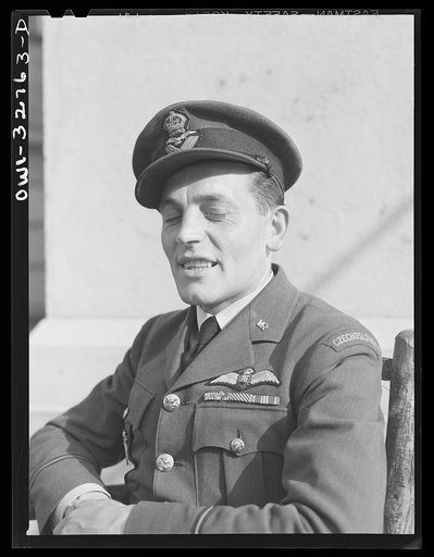 Untitled photo, possibly related to: Oswego, New York. A Czechoslovakian flier in the Royal Air Force visiting Oswego during United Nations week