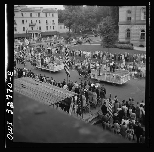 Untitled photo, possibly related to: Oswego, New York. Ames Ironworks float, drawn by horses because of the gas rationing, in the United Nations week parade