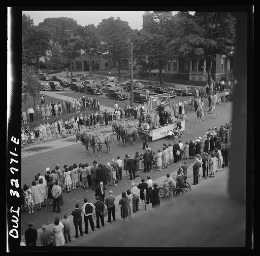Untitled photo, possibly related to: Oswego, New York. Ames Ironworks float, drawn by horses because of the gas rationing, in the United Nations week parade