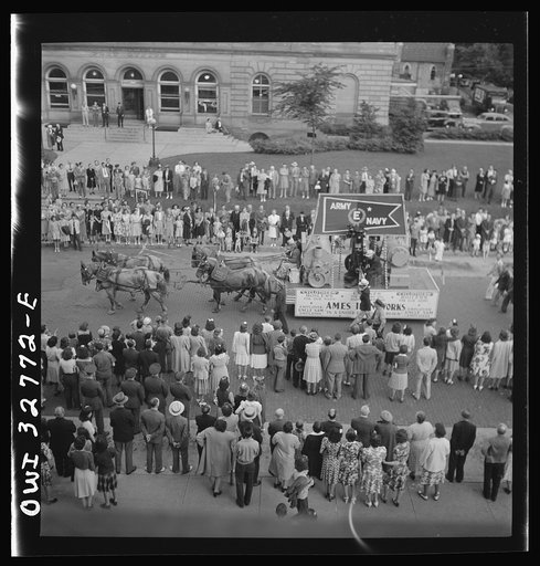 Oswego, New York. Ames Ironworks float, drawn by horses because of the gas rationing, in the United Nations week parade