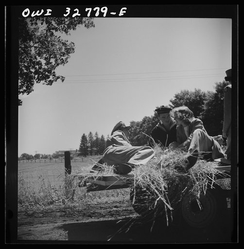 Untitled photo, possibly related to: Oswego, New York. Hay ride for the United Nations heroes and Oswego girls during United Nations week