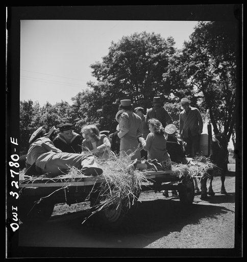 Untitled photo, possibly related to: Oswego, New York. Hay ride for the United Nations heroes and Oswego girls during United Nations week