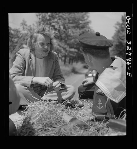 Untitled photo, possibly related to: Oswego, New York. A Norwegian sailor and an Oswego girl on a hayride during United Nations week