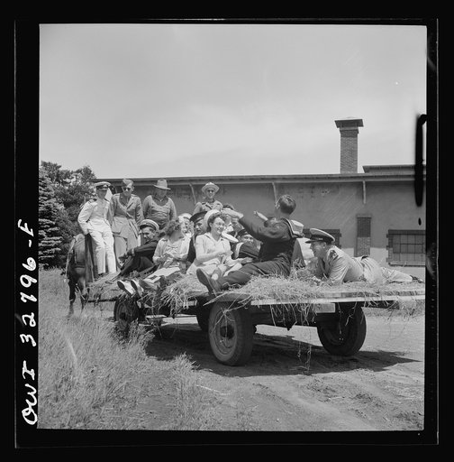 Untitled photo, possibly related to: Oswego, New York. A Norwegian sailor and an Oswego girl on a hayride during United Nations week