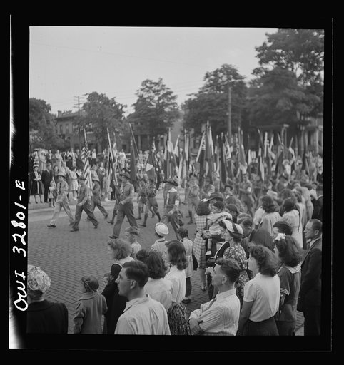 Untitled photo, possibly related to: Oswego, New York. United Nations heroes marching in the Flag Day parade during United Nations week