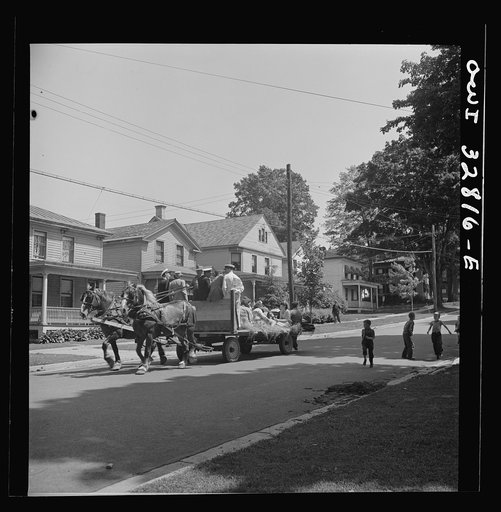 Untitled photo, possibly related to: Oswego, New York. A hayride for the United Nations heroes and Oswego girls during United Nations week
