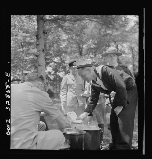 Oswego, New York. United Nations heroes being served lunch at the boy scout outing during United Nations week