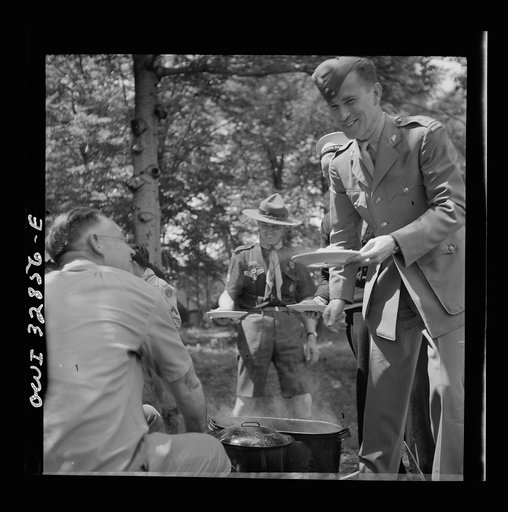 Untitled photo, possibly related to: Oswego, New York. United Nations heroes being served lunch at the boy scout outing during United Nations week
