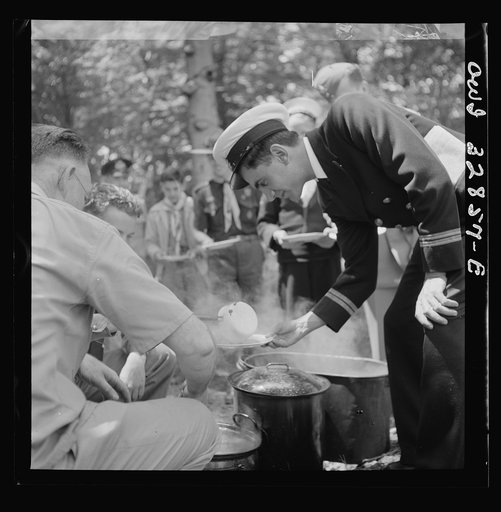 Untitled photo, possibly related to: Oswego, New York. United Nations heroes being served lunch at the boy scout outing during United Nations week