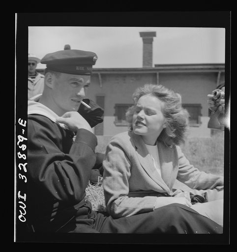 Untitled photo, possibly related to: Oswego, New York. A Norwegian sailor and an Oswego girl on a hayride during United Nations week