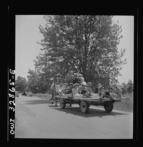 Untitled photo, possibly related to: Oswego, New York. Hay ride for the United Nations heroes and Oswego girls during United Nations week