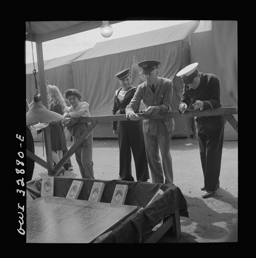 Oswego, New York. United Nations heroes gambling at the carnival during United Nations week