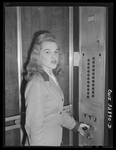 Philadelphia, Pennsylvania. Miss Dorothy Eyster, an elevator operator at a downtown office building