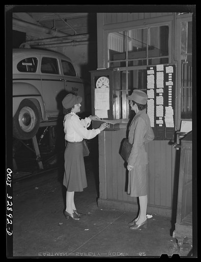 Untitled photo, possibly related to: Philadelphia, Pennsylvania. Mrs. Abbie Corby (left) and Mrs. Suzanne O'Donnell drivers for the Yellow Cab Company