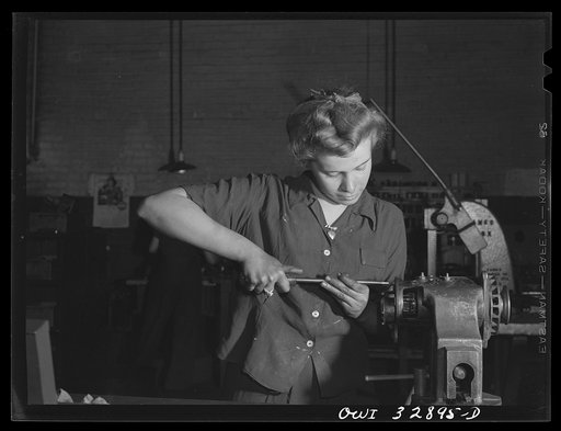 Philadelphia, Pennsylvania. Miss Jean Casey, sixteen years old, a mechanic at a Yellow Cab Company garage. She came to work after a preliminary training at the Dobbins Vocational School
