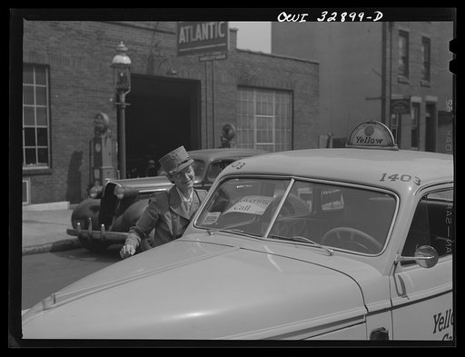 Untitled photo, possibly related to: Philadelphia, Pennsylvania. Mrs. Abbie Corby (left) and Mrs. Suzanne O'Donnell, drivers for the Yellow Cab Company