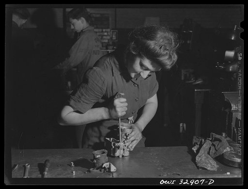Philadelphia, Pennsylvania. Miss Marian Price, eighteen years old, a garage mechanic for the Yellow Cab Company. She was formerly a busgirl at a cafeteria