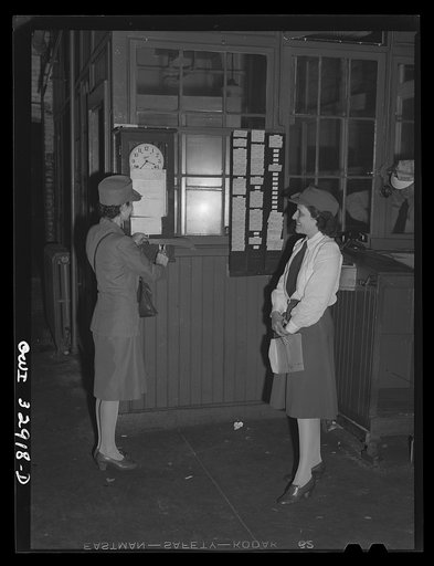 Philadelphia, Pennsylvania. Mrs. Abbie Corby (left) and Mrs. Suzanne O'Donnell drivers for the Yellow Cab Company