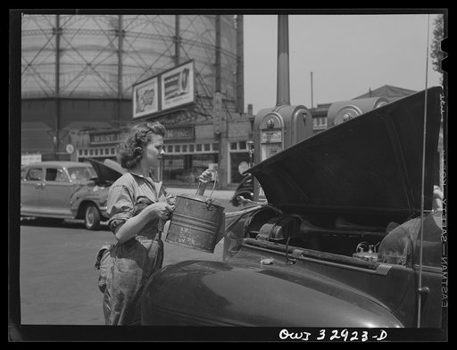 Untitled photo, possibly related to: Philadelphia, Pennsylvania. Miss Ruth Gusick, formerly a clerk in a drugstore, now works as a garage attendant at one of the Atlantic Refining Company garages