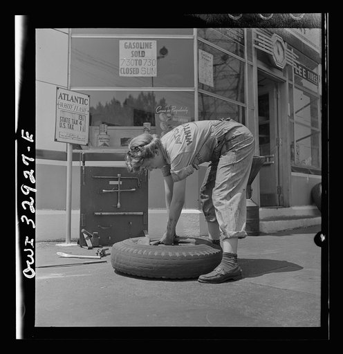 Philadelphia, Pennsylvania. Miss Natalie O'Donald, a garage attendant at the Atlantic Refining Company
