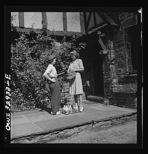 Untitled photo, possibly related to: Bryn Mawr, Pennsylvania. Mrs. Helen Joyce, one of the many women now working for the Supplee-Wills-Jones Milk Company. She is making her rounds collecting bills