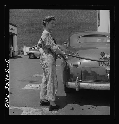 Untitled photo, possibly related to: Philadelphia, Pennsylvania. Miss Frances Heisler, a garage attendant at one of the Atlantic Refining Company garages. She was formerly a clerk in the payroll department of the Curtis Publishing Company