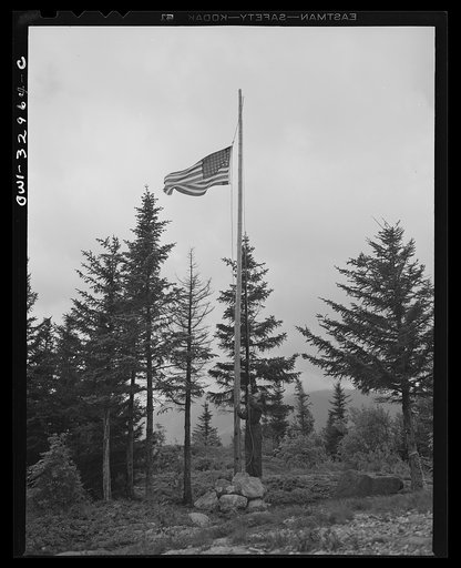 Untitled photo, possibly related to: Gorham (vicinity), New Hampshire. Barbara Mortensen, a fire and airplane lookout on Pine Mountain, running up the colors