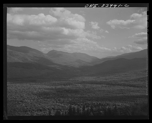 Gorham (vicinity), New Hampshire. A view looking south through the White Mountains from the fire tower manned by Barbara Mortensen, a fire and airplane lookout on Pine Mountain