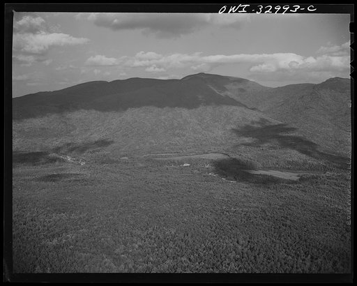 Gorham (vicinity), New Hampshire. A view looking east through the White Mountains from the fire tower manned by Barbara Mortensen, a fire and airplane lookout on Pine Mountain