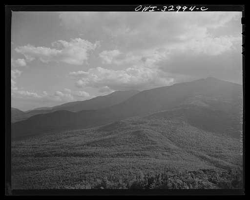Gorham (vicinity), New Hampshire. A view looking south through the White Mountains from the fire tower manned by Barbara Mortensen, a fire and airplane lookout on Pine Mountain