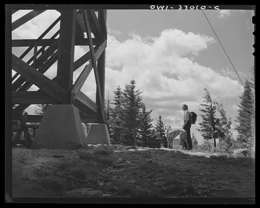 Gorham (vicinity), New Hampshire. Barbara Mortensen, a fire and airplane lookout on Pine Mountain, returning from Gorham where she had gone to replenish her food stock