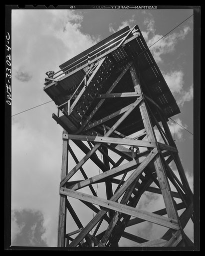 Gorham (vicinity), New Hampshire. Barbara Mortensen, along with her fire lookout duties on Pine Mountain, also spots planes for the Interceptor Command