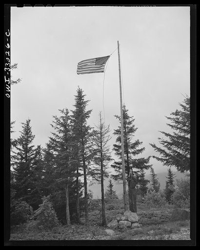 Untitled photo, possibly related to: Gorham (vicinity), New Hampshire. Barbara Mortensen, a fire and airplane lookout on Pine Mountain, running up the colors