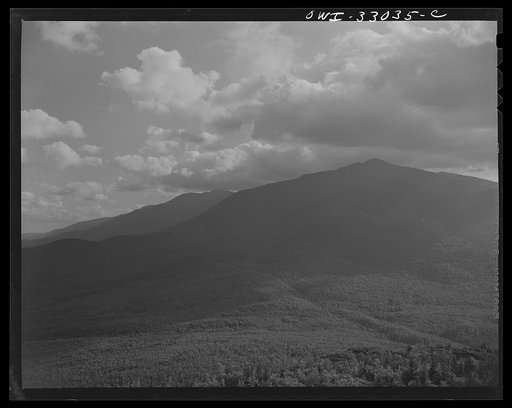 Untitled photo, possibly related to: Gorham (vicinity), New Hampshire. A view looking south through the White Mountains from the fire tower manned by Barbara Mortensen, a fire and airplane lookout on Pine Mountain