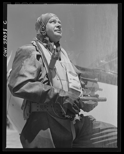 Bar Harbor, Maine. Civil Air Patrol base headquarters of coastal patrol no. 20. A flyer in an all-rubber crash suit